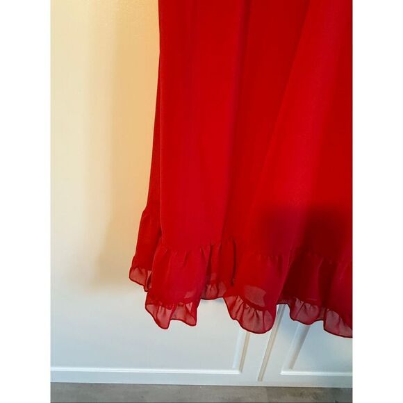 Spaghetti strap chiffon baby doll dress with a v-neckline, crisscross back, and - Picture 6 of 10